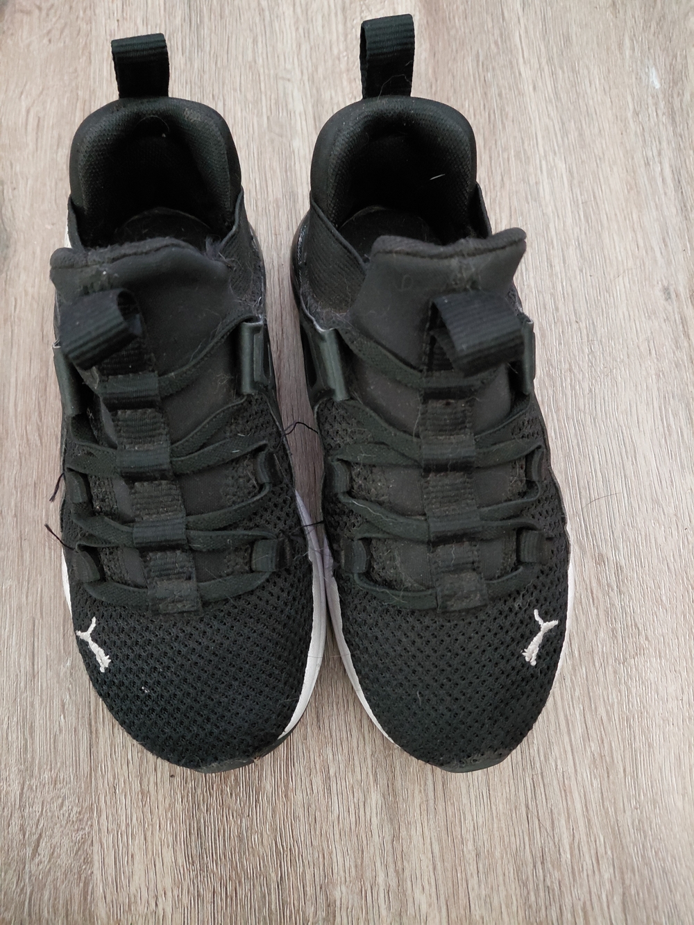 Puma Kids Black and White Slip-On Sneakers